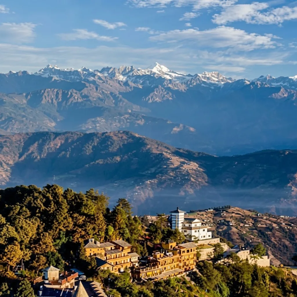 Hilltop hotels and lodges of Nagarkot overlooking rolling valleys and snow-covered Himalayan summits.