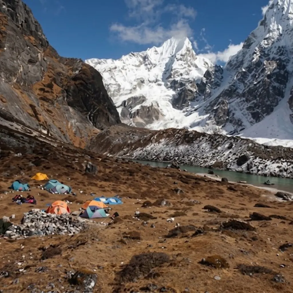 Colorful wilderness expedition camp tents pitched beside a glacial lake along the Makalu Base Camp trekking route.